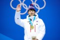 Gold medallist Lim Hyo-jun of South Korea celebrates on the podium during a ceremony at the 2018 Pyeongchang Winter Olympics. File photo: Getty Images