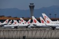 Air China planes are seen parked on the tarmac at Beijing Capital Airport in March 2020. Photo: AFP