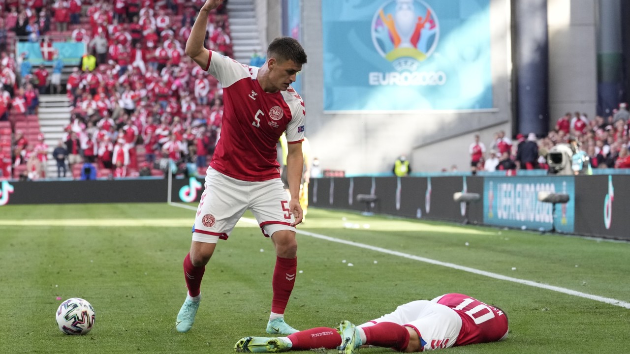 Denmark’s Christian Eriksen given CPR by medial staff after collapsing on pitch during Euro 2020 football match