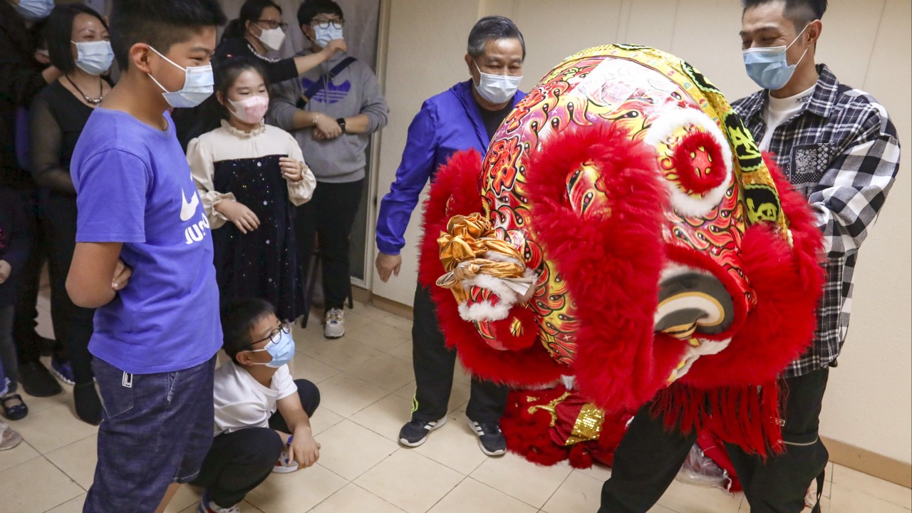 Underprivileged children learn to become mighty Hong Kong lions after performing traditional dance workshop as part of Operation Santa Claus thumbnail