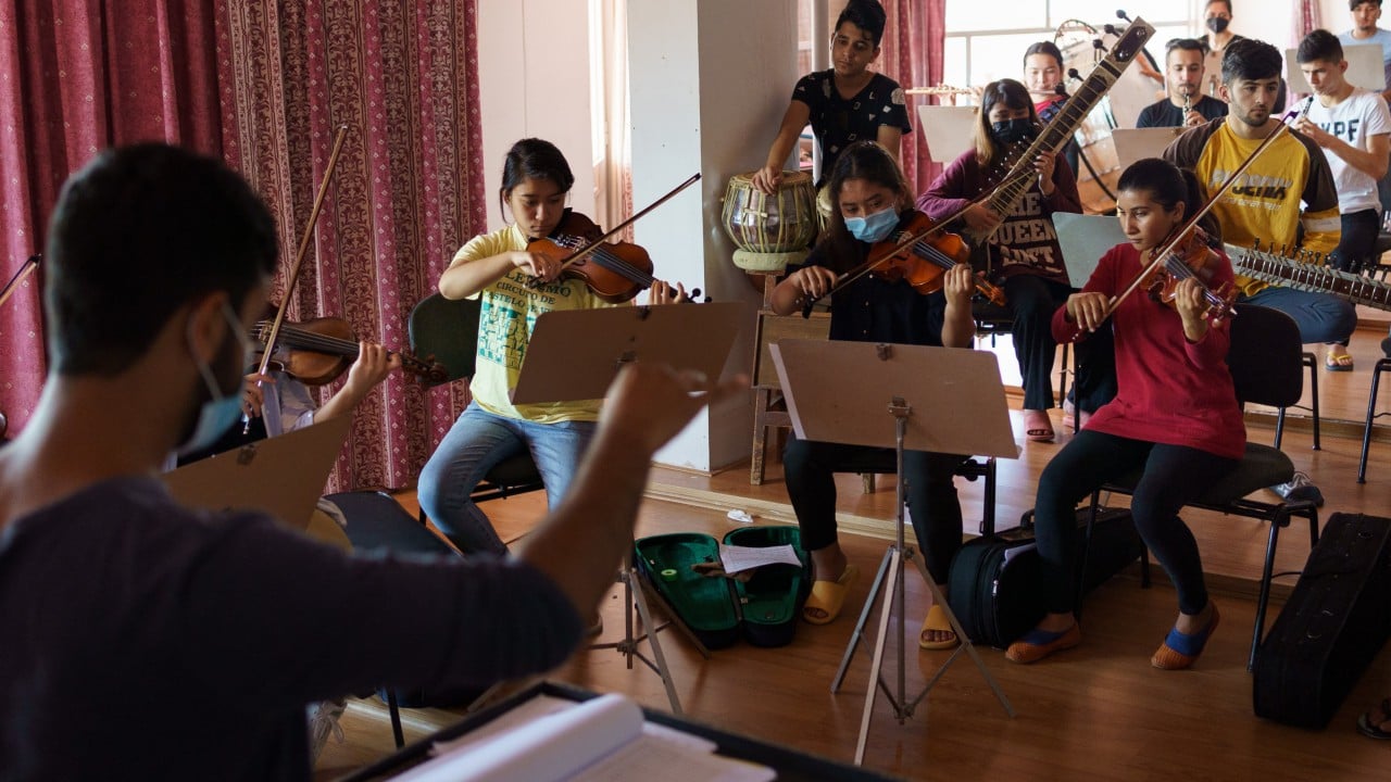 Young Afghan musicians who fled the Taliban’s ban on music struggle to keep their traditions alive