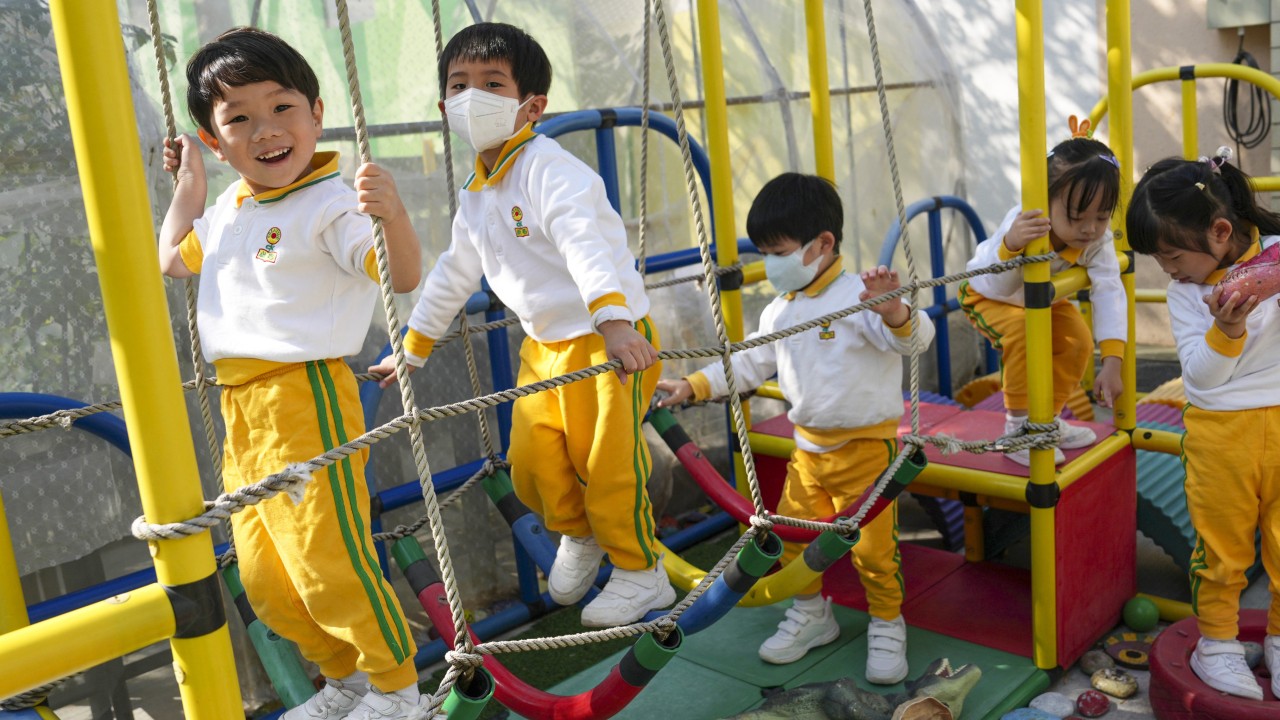 Schoolchildren should not wear masks in classrooms as they can hinder speech development, Hong Kong pandemic adviser says