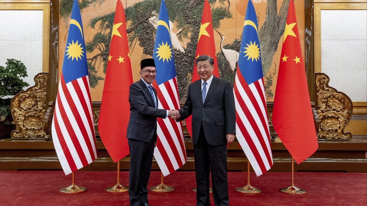 Work together to resist cold war-style bloc conflict, China urges Singapore and Malaysia