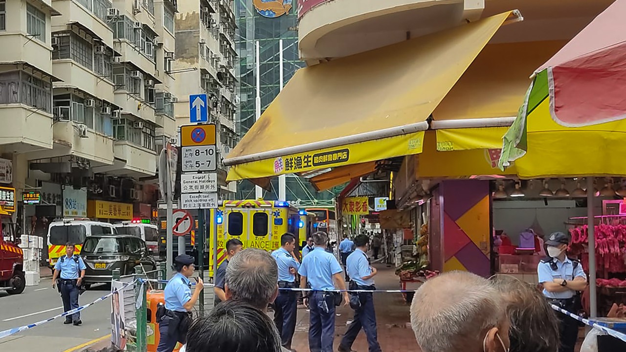 Hong Kong police alerted after woman claims husband killed 3 daughters and stabbed her