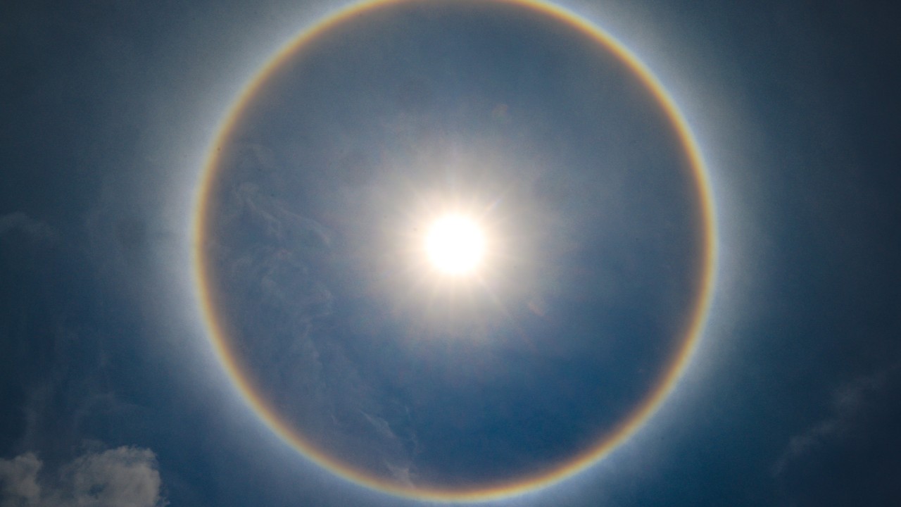 Rare natural phenomenon dazzles Hong Kong with temporary halo around the sun