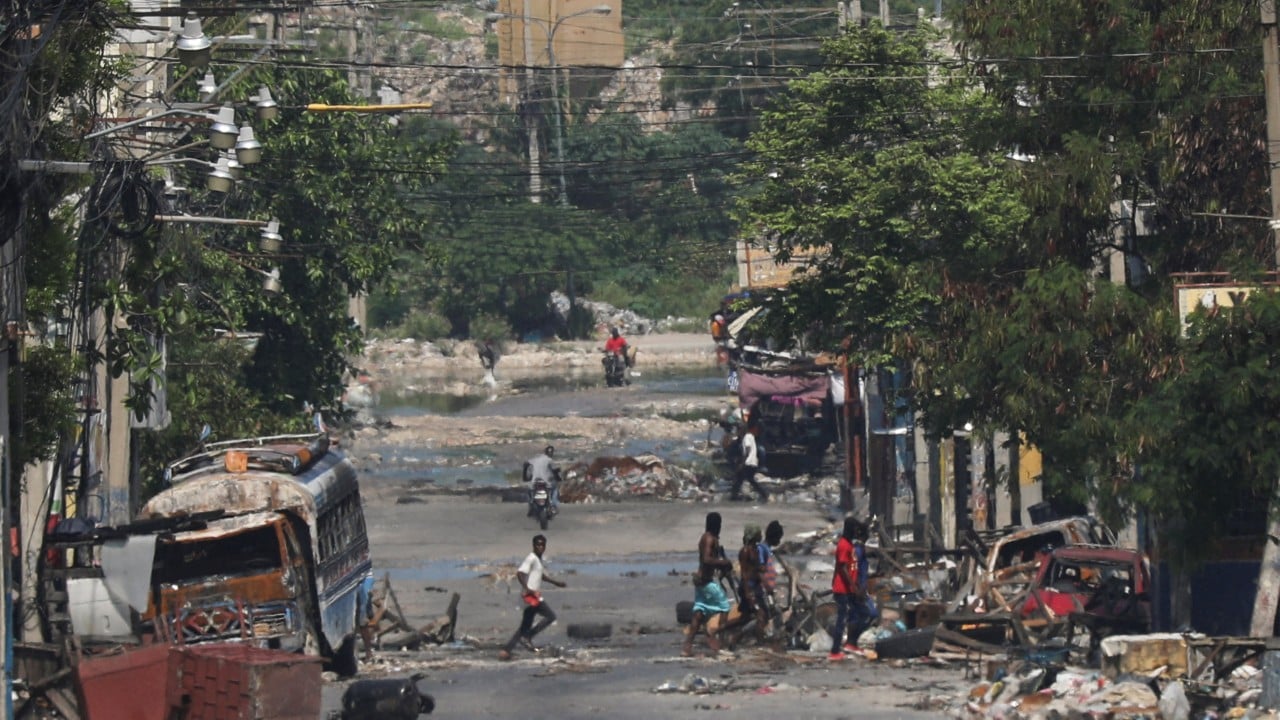 Haiti crisis: transitional government takes power as gangs hold capital ‘hostage’