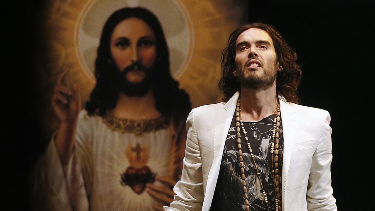 Russell Brand says baptism is ‘opportunity to leave past behind’ amid sex assault allegations