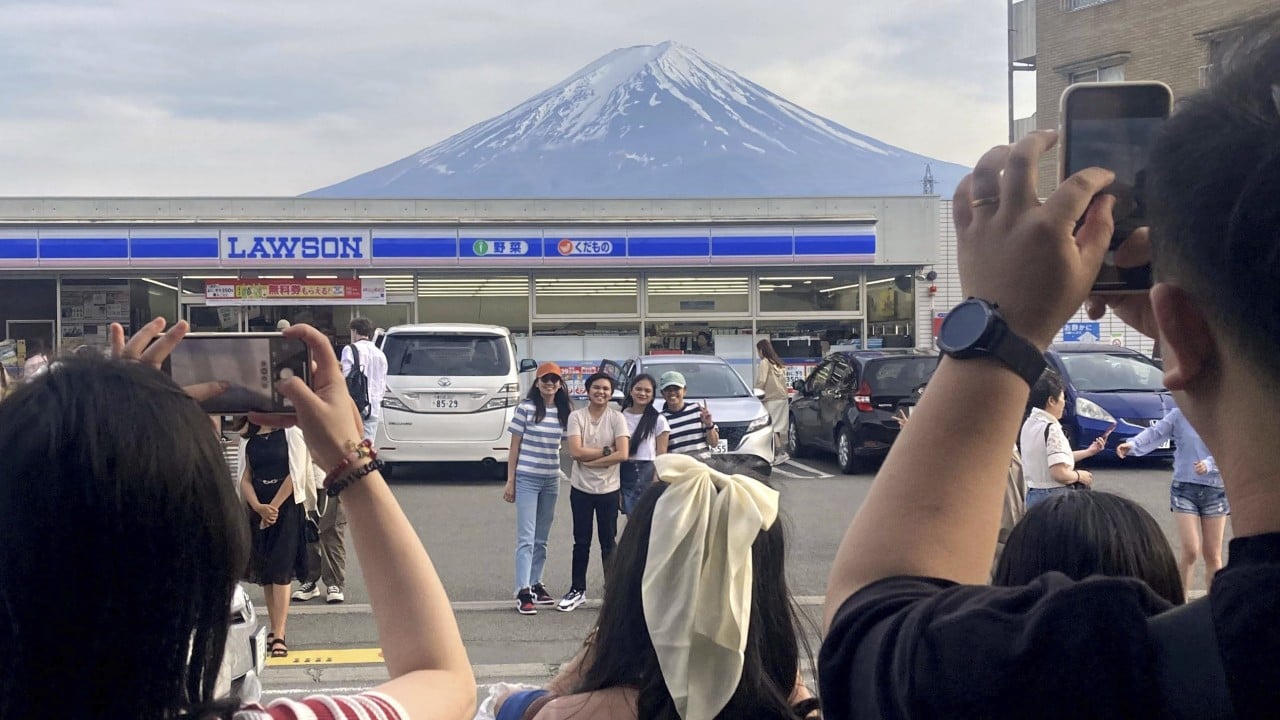 Japanese town to block view of Mount Fuji to fend off tourists