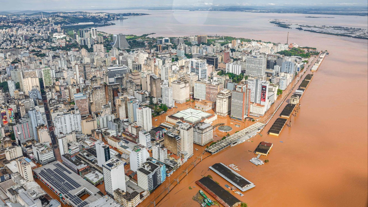 Record flooding turns streets of Brazil’s Porto Alegre into rivers, trapping people in high-rises