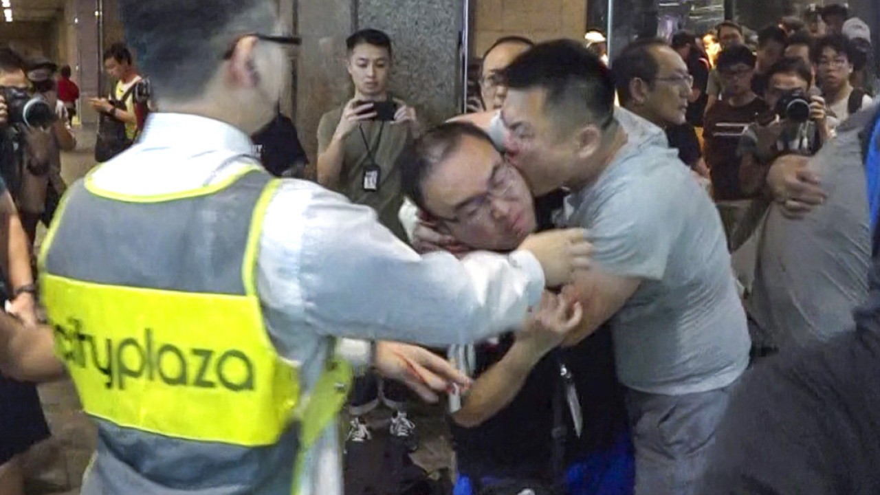 Hong Kong protests: jobless man who bit off ex-politician’s ear and attacked three others has jail sentence reduced to 14 years