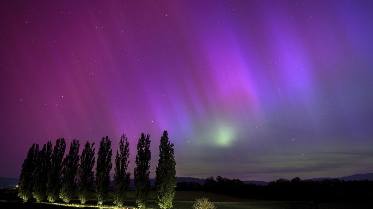 Auroras sparkle as massive solar storm strikes Earth, threatening to disrupt satellites, power grids
