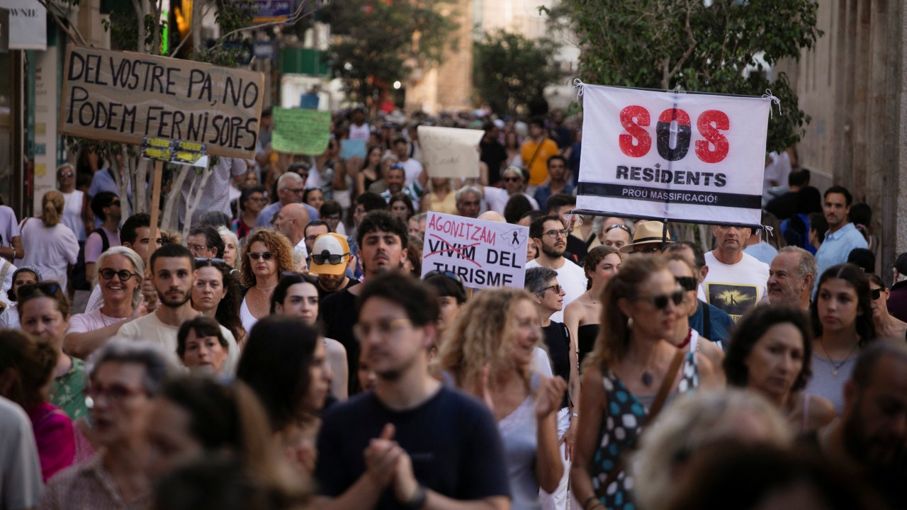 Thousands protest against mass tourism on Spanish island of Mallorca