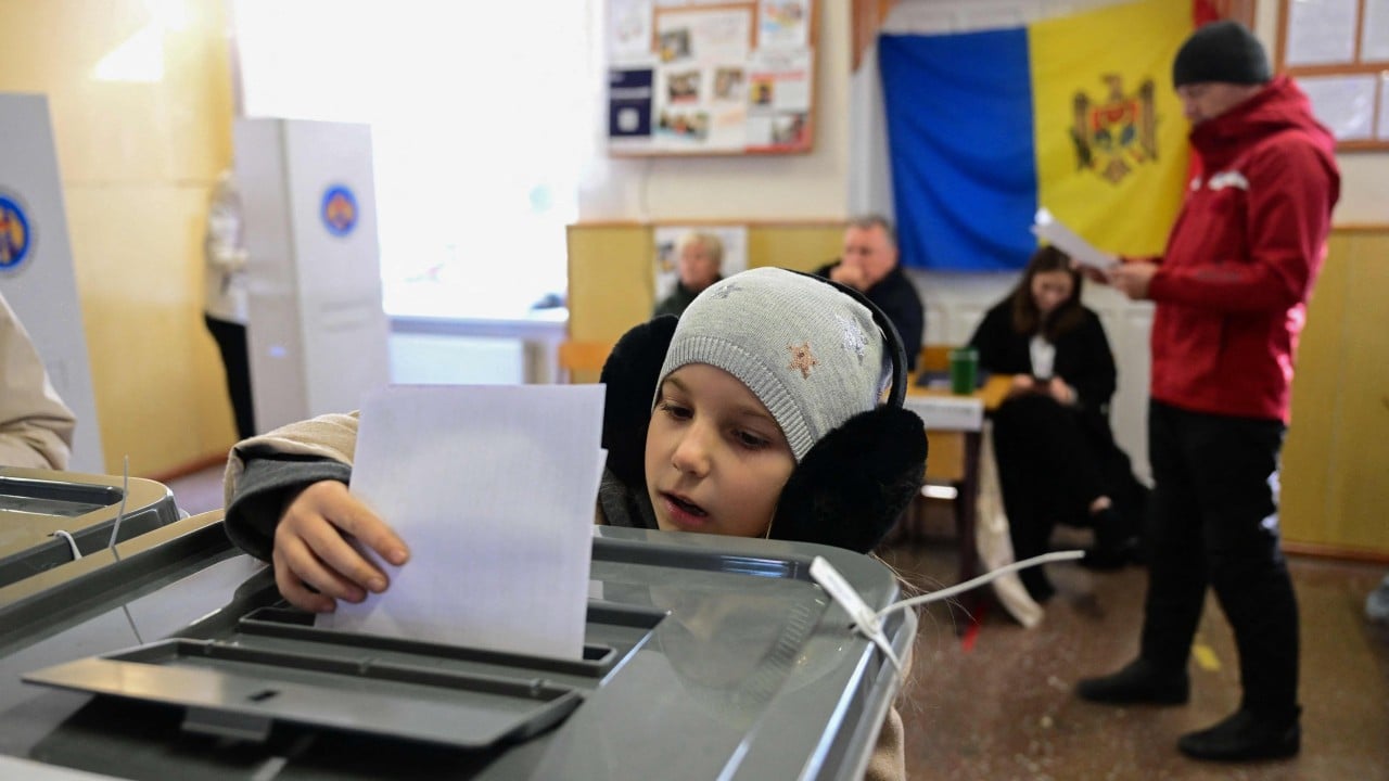 Moldova votes in election, EU referendum in shadow of alleged Russia meddling