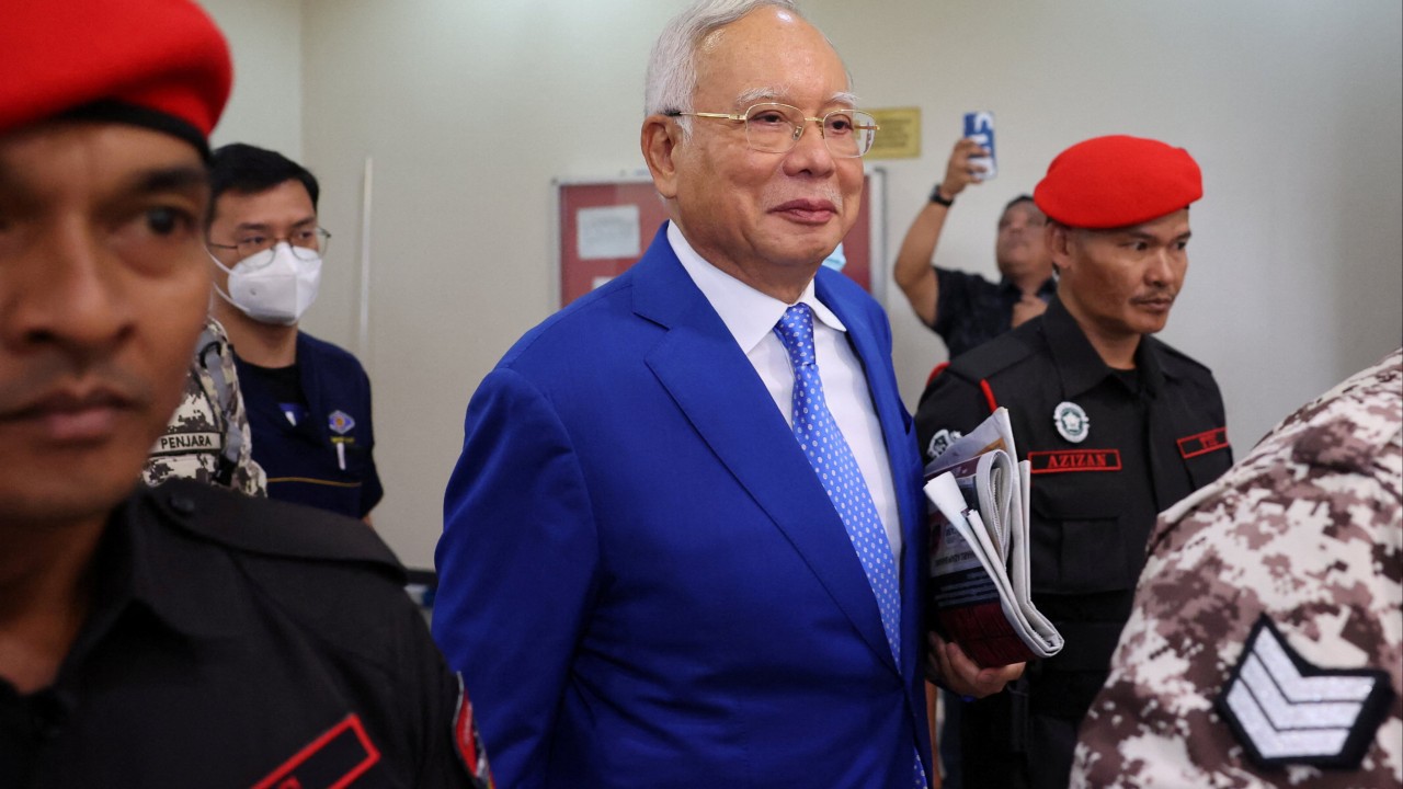 Malaysia drops Najib’s 6 charges over 1MDB as house arrest rumours swirl