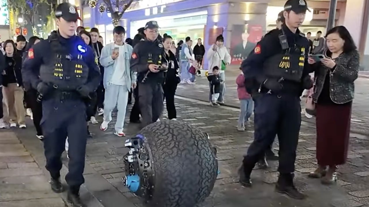 Officers on patrol in China test ball-shaped robot as Beijing pushes hi-tech policing