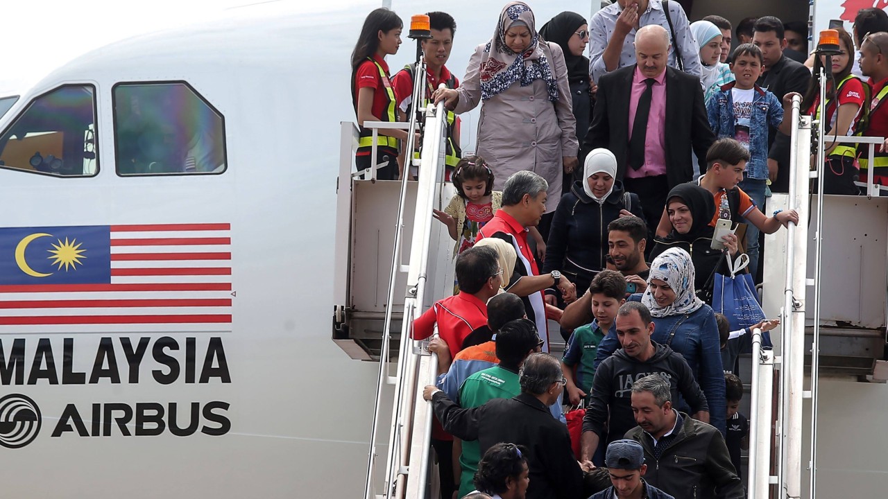 For Malaysia’s Syrian refugees, Assad’s fall is bittersweet