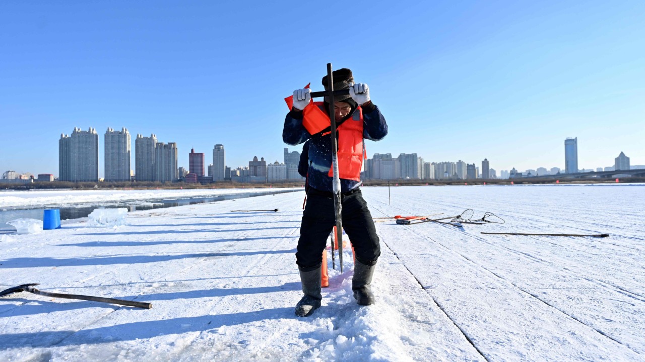 Harbin river ice cutters feel the heat as warm autumn affects their bottom line