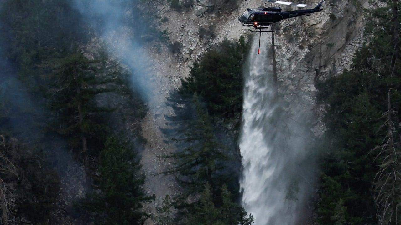 Winds fuelling Los Angeles wildfires calm down as accusations fly: ‘we’re underfunded’