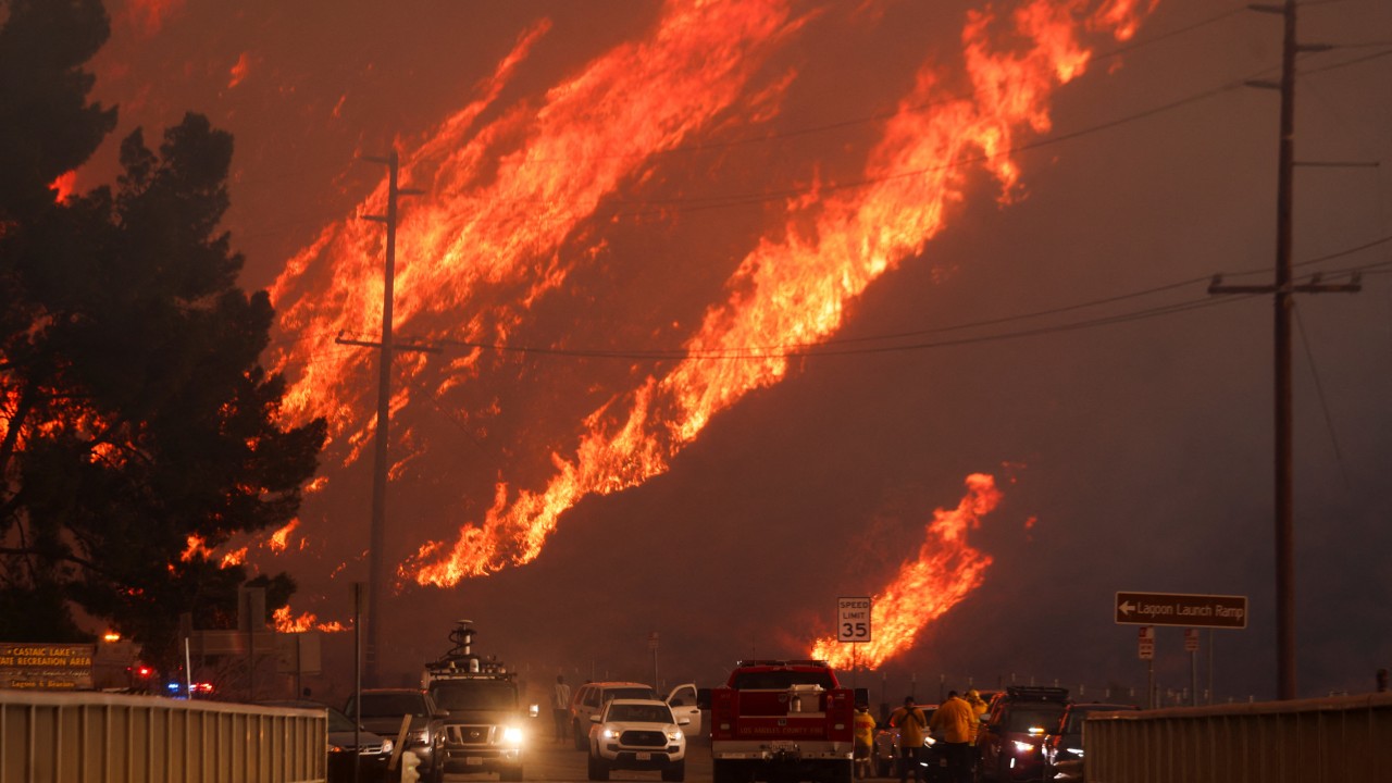 Explosive new wildfire erupts near Los Angeles, forcing mass evacuations