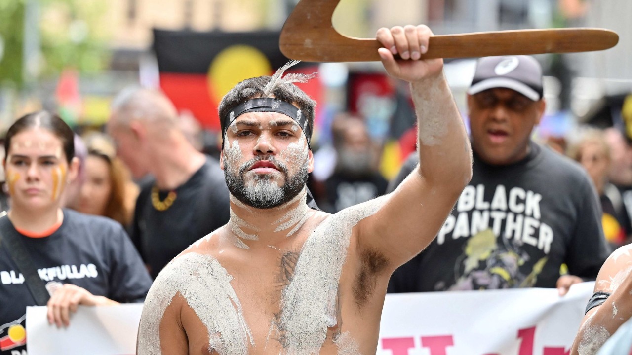 Australia Day protesters support Aboriginal groups, deface statues