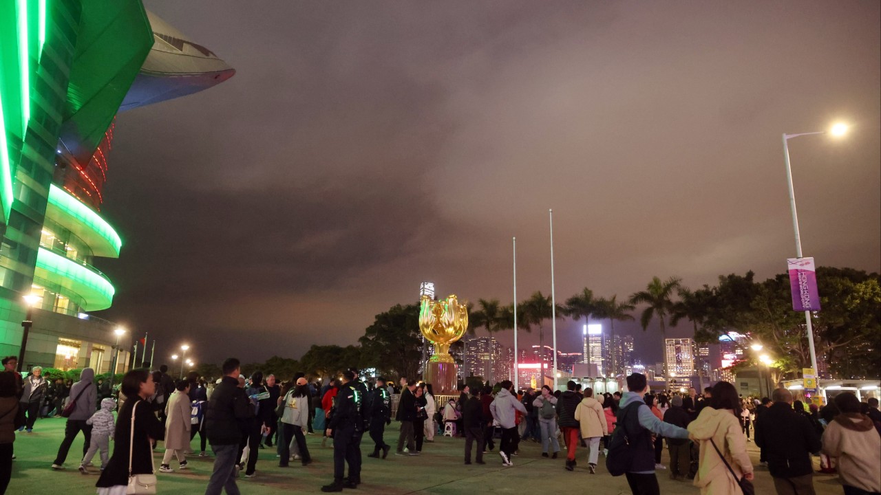 Crowds gather early for Lunar New Year fireworks show in Hong Kong
