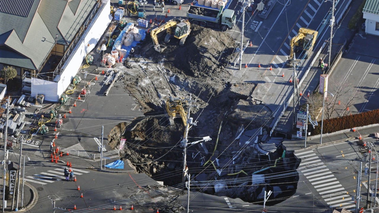 Japan pensioner still missing as sinkhole - now 40 metres across - keeps growing