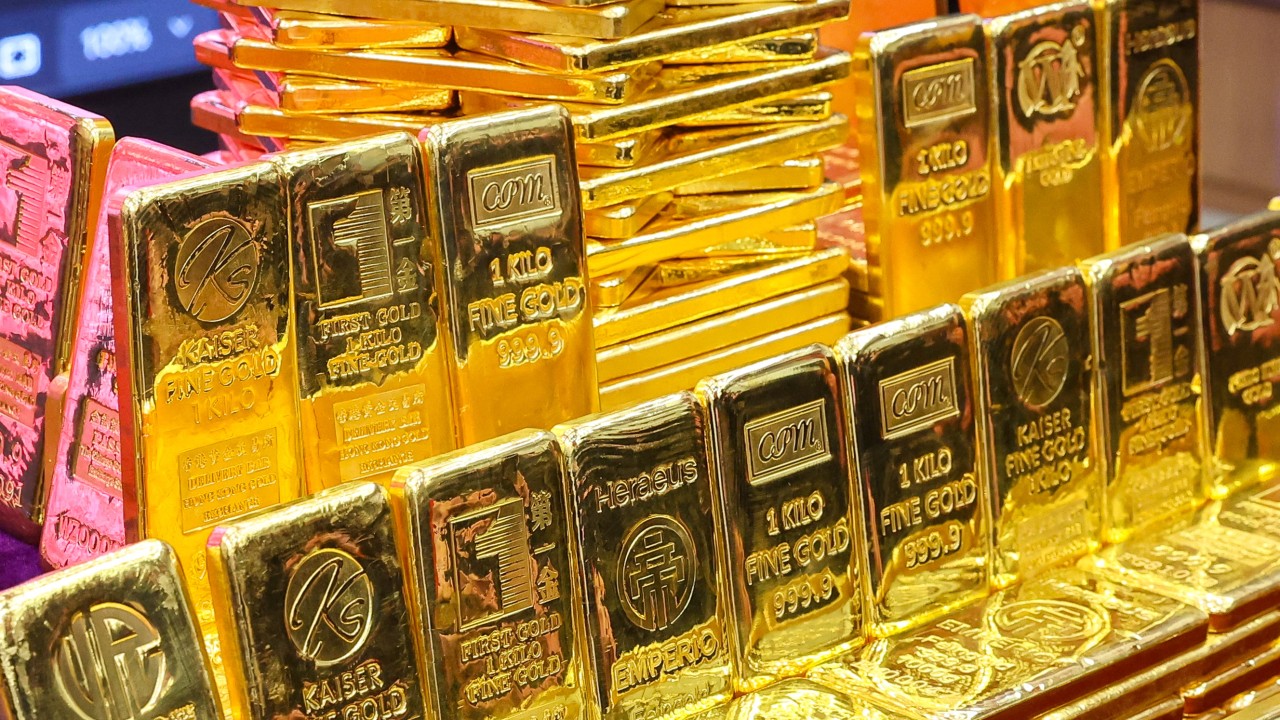 Trump tariffs push gold prices to record high as investors seek safe haven