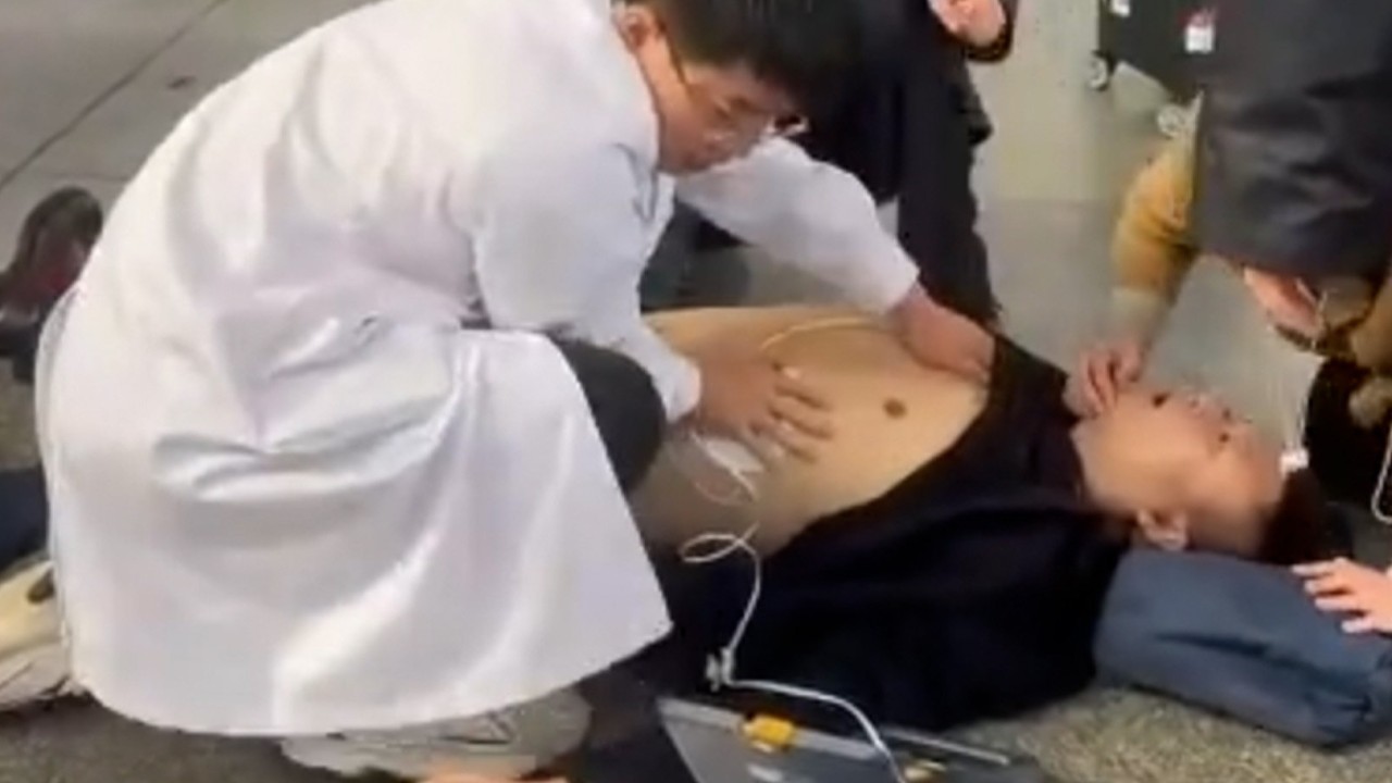 First words of revived China heart attack man at railway station ‘I need to rush to work’