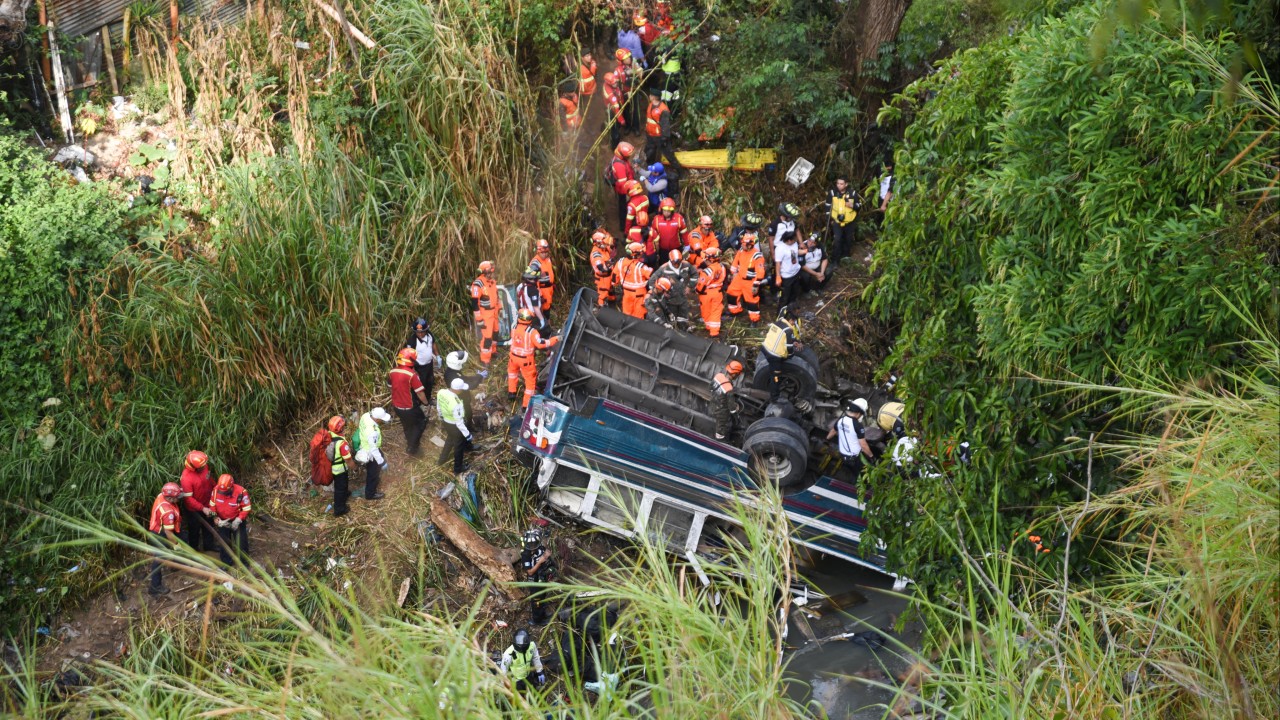 At least 51 dead in Guatemala after bus plunges off bridge