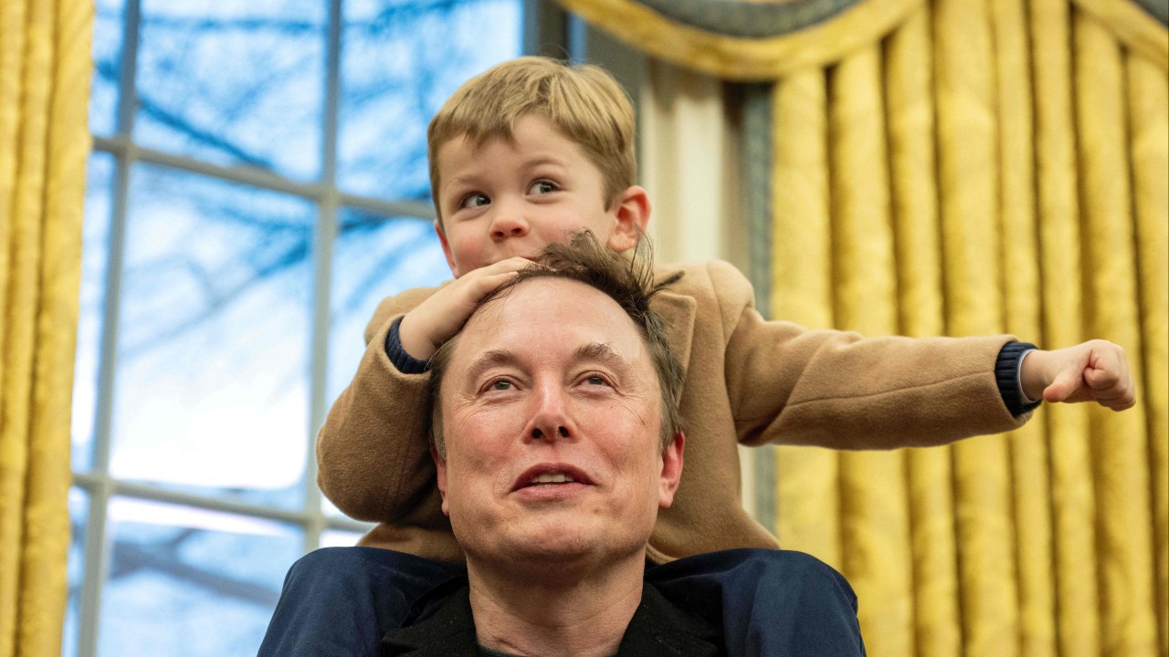 Elon Musk defends US cuts as son X steals show in Oval Office appearance