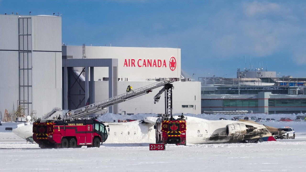 8 injured after plane flips upside down, crashes at Toronto airport