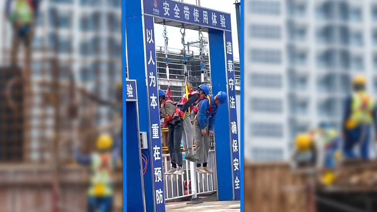 Public shock as China construction worker trio hung on gate by harnesses in safety training