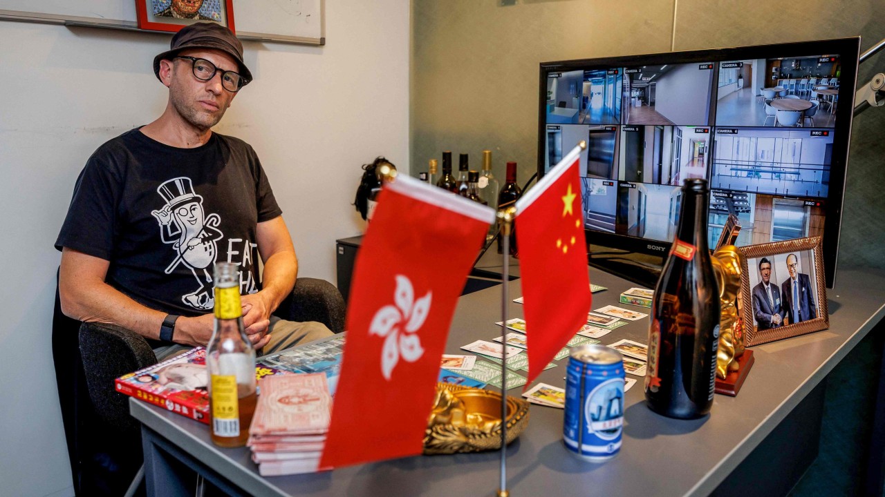 Hong Kong’s corporate culture challenged in defiant art exhibition set in an office space