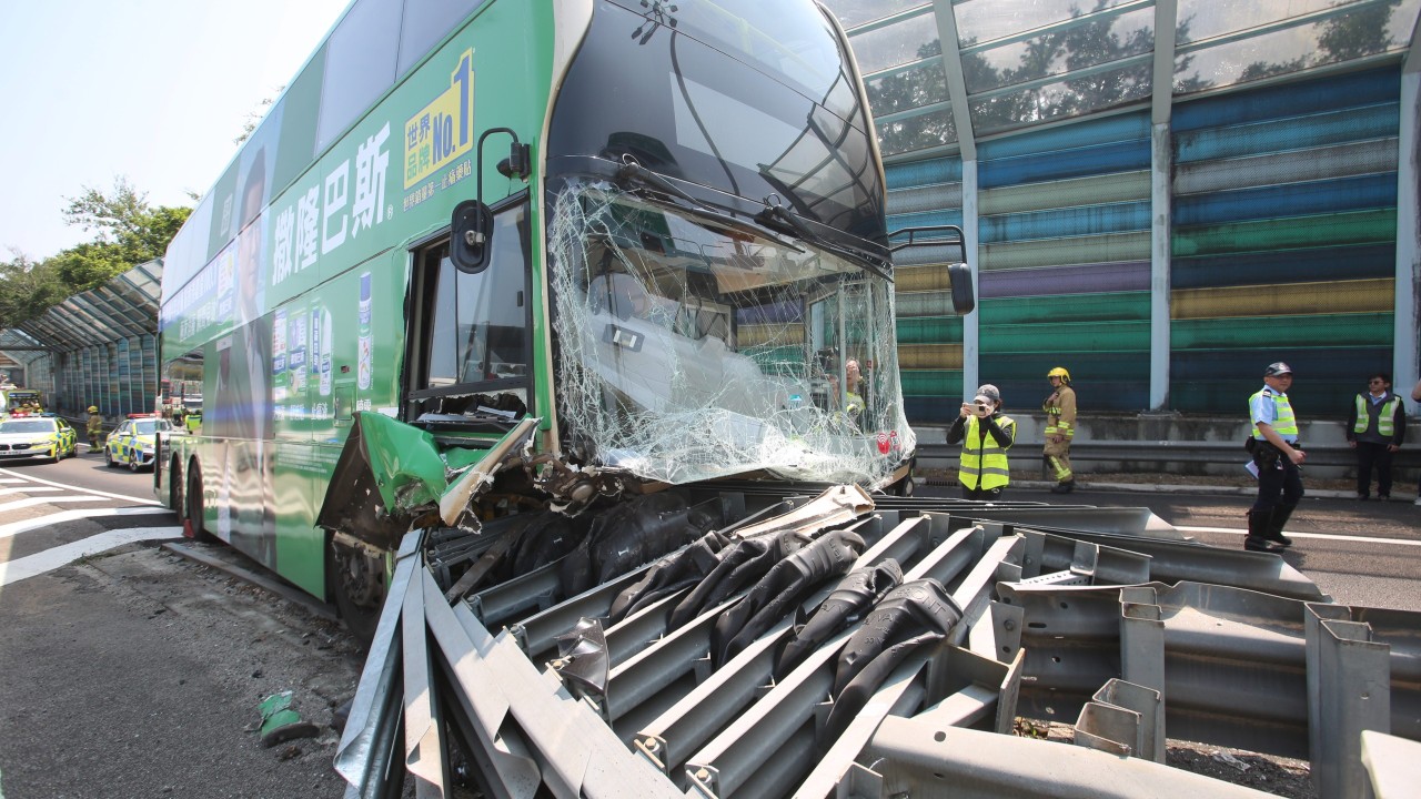 Bus crash on Hong Kong highway leaves driver, 11 passengers injured