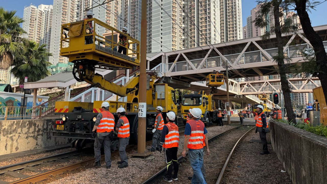 Hong Kong driver arrested after crane hits overhead cable, disrupting light rail services