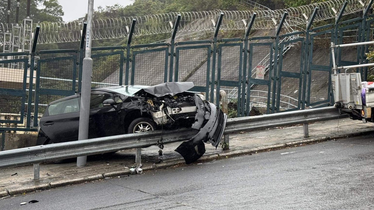 2 injured after truck slips down slope and crashes into car in Hong Kong
