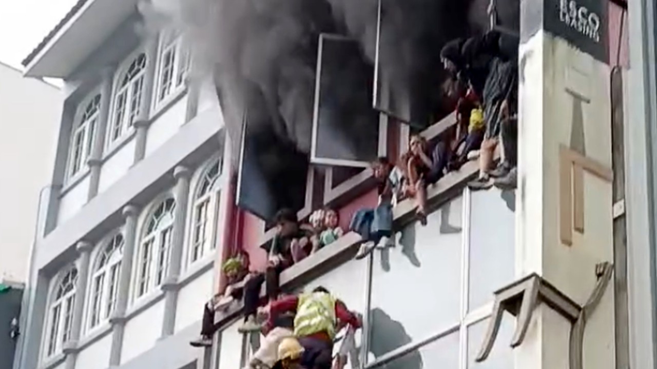Migrant workers hailed as heroes after Singapore shophouse fire rescue