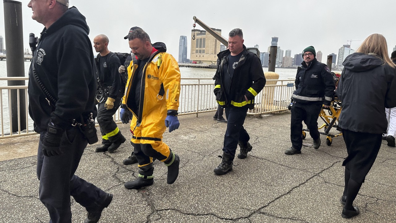 Helicopter crashes into river in New York