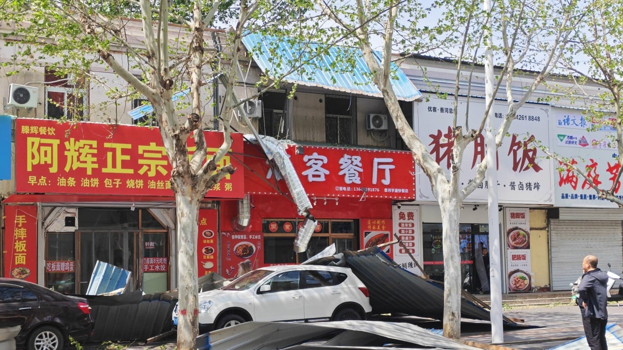 Millions of Beijing residents told to stay at home as strong winds batter northern China