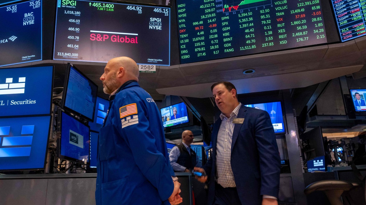 US and China exchange barbs over tariffs at the end of a week that shook markets