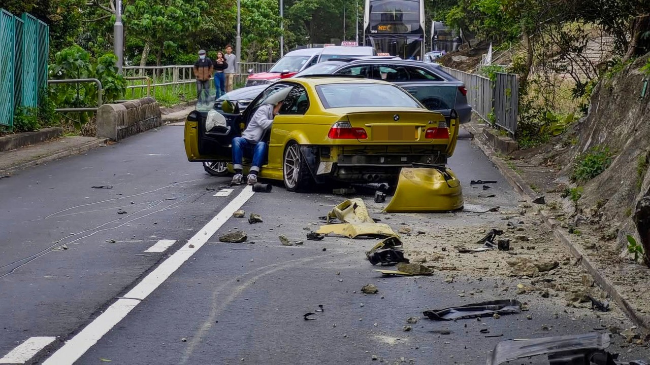 2 injured as car hits wall and goes airborne on Hong Kong road