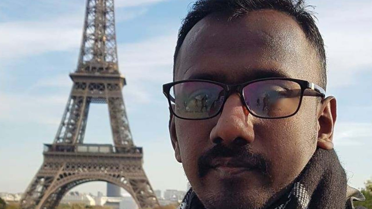 Malaysian journalist in bribe scandal returns, vowing to report ‘without fear or favour’