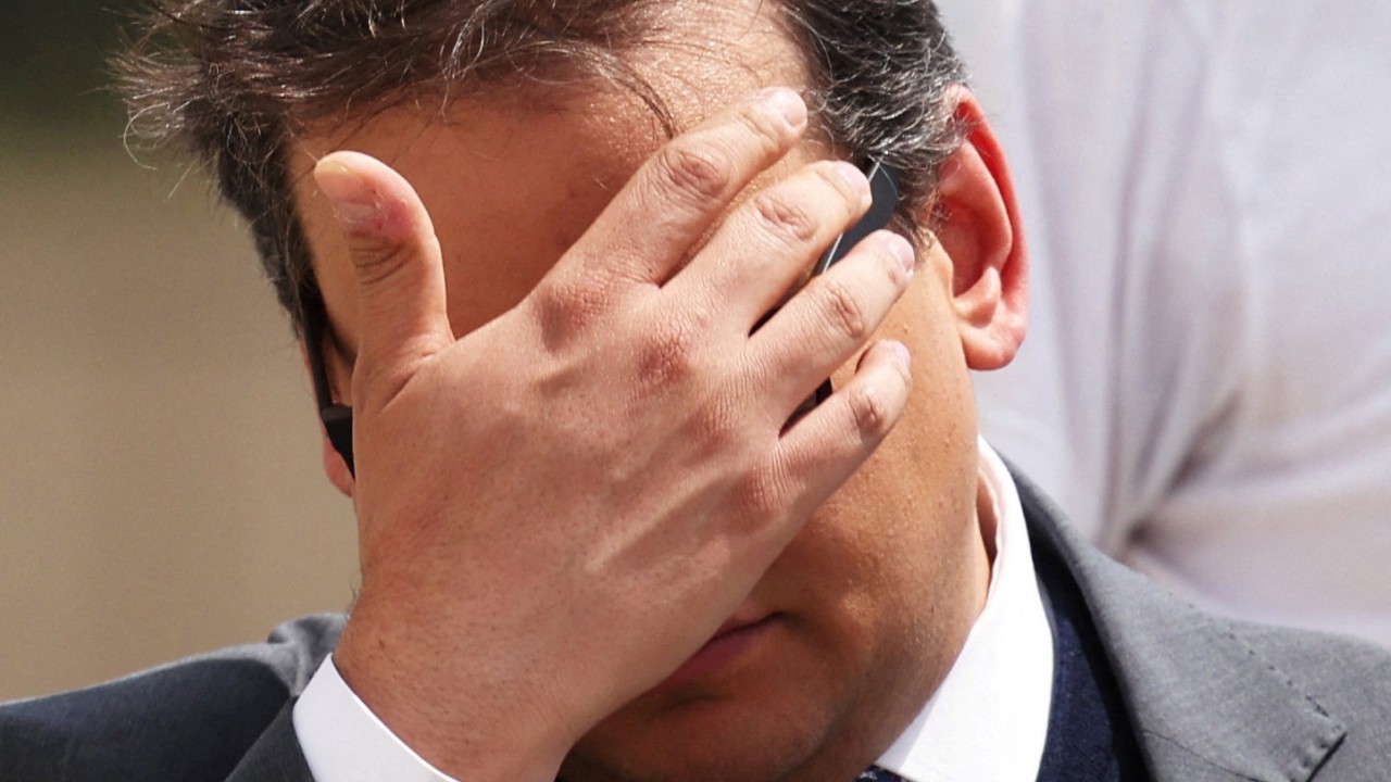 Ex-US congressman George Santos sobs as he’s jailed for over 7 years for fraud