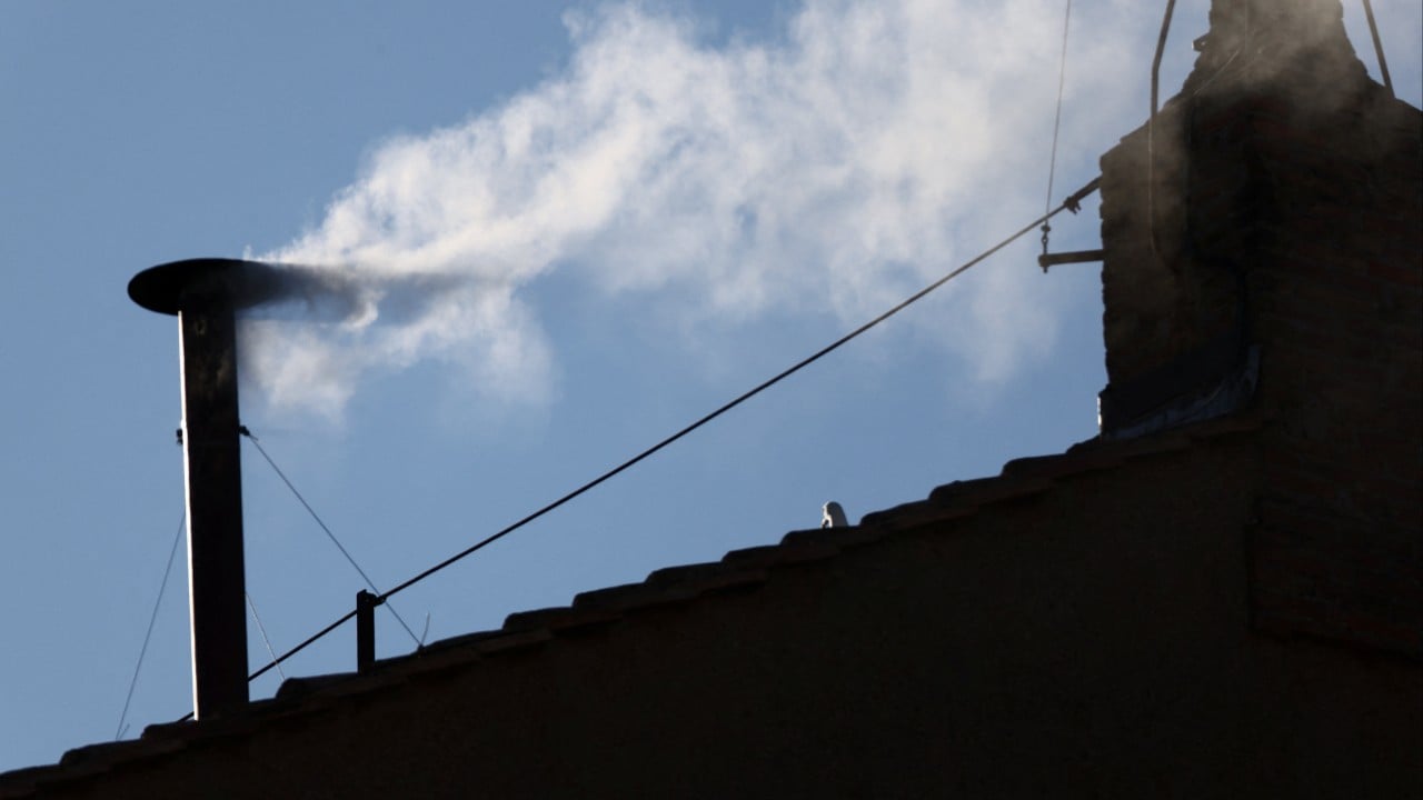 White smoke billows from Sistine Chapel, signalling new pope elected
