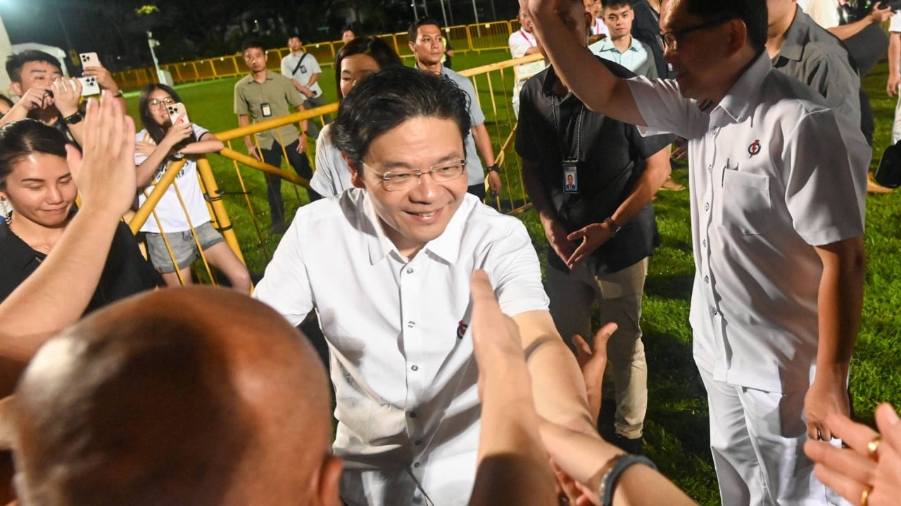 Attention on Singapore cabinet reveal sidetracked by ministers’ photos with Fujian gang member