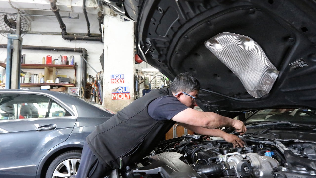 Hong Kong garages feeling squeeze but EVs offer chance for upgrade: experts