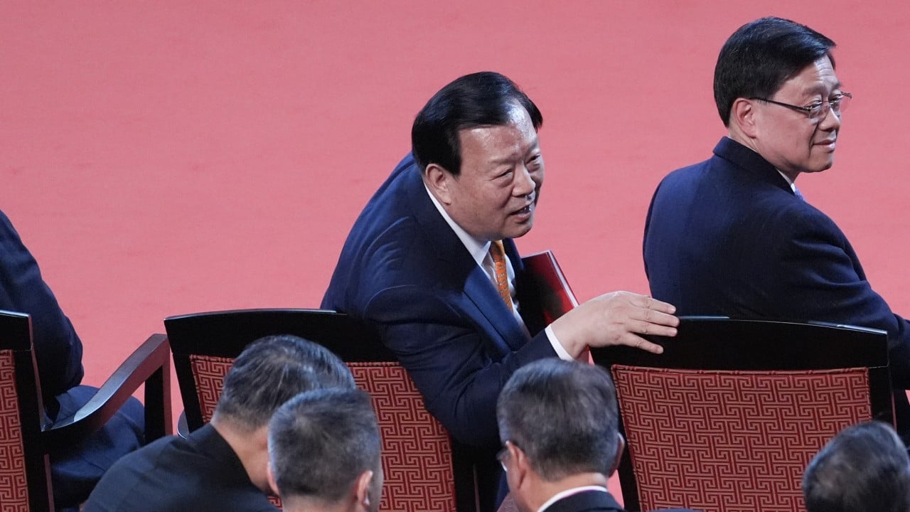 Xia Baolong urges Hong Kong, Macau business leaders to defend national interests