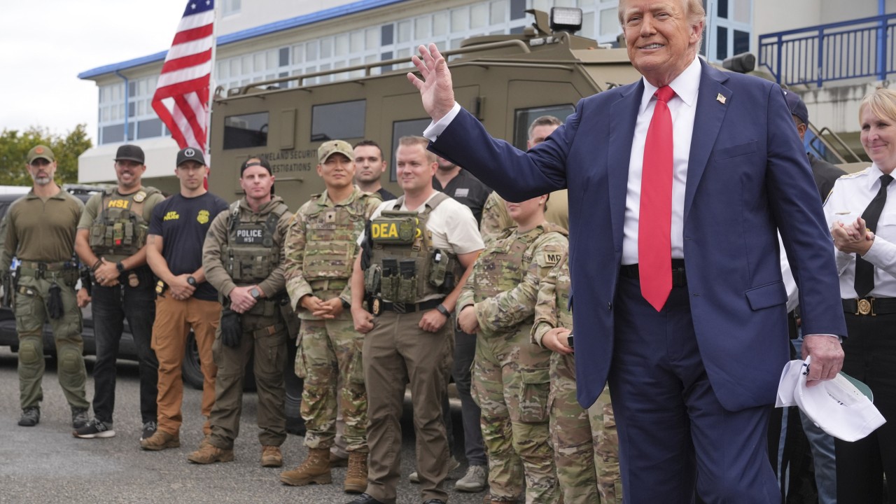 Trump visits police, troops in Washington after saying he would patrol streets