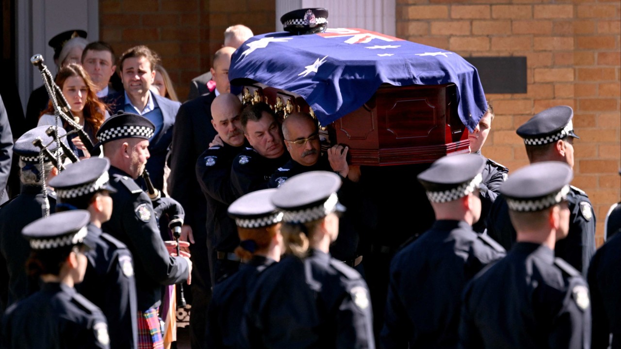 Australia posts US$659,000 reward for gunman’s arrest over police killings