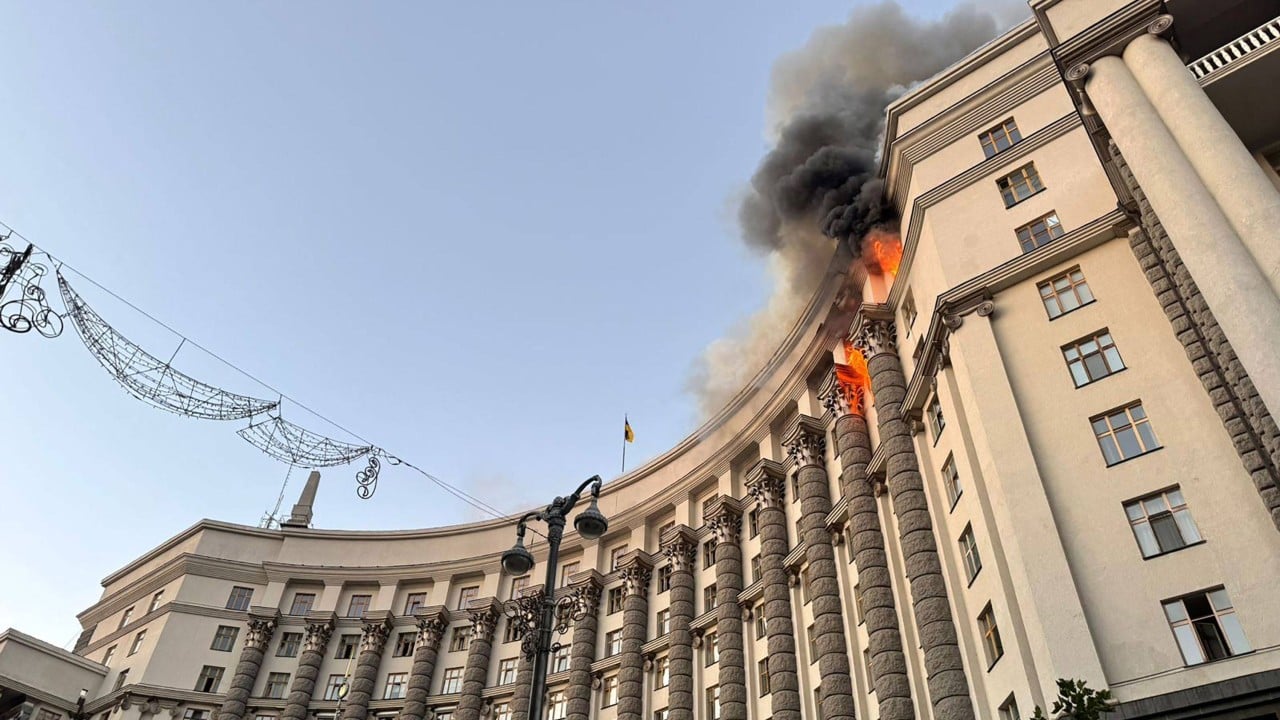 Ukraine government building ablaze in Russia’s biggest air attack of war